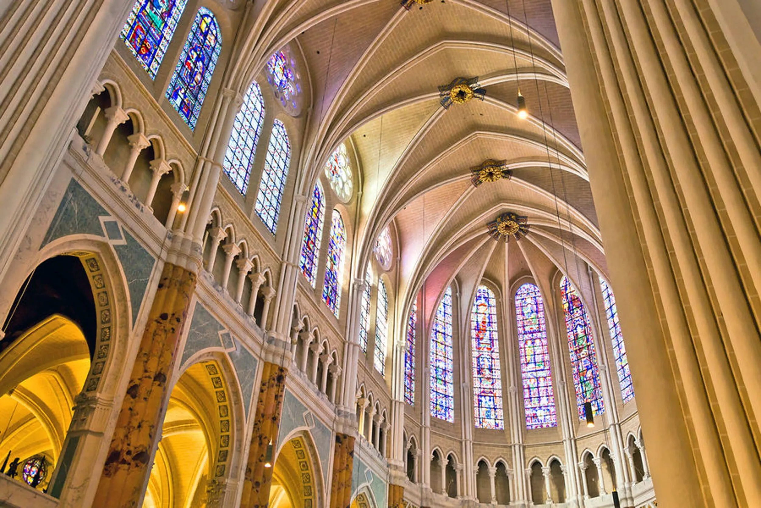 Interior of Chartres Cathedral with Gothic architecture and stained glass windows in France
